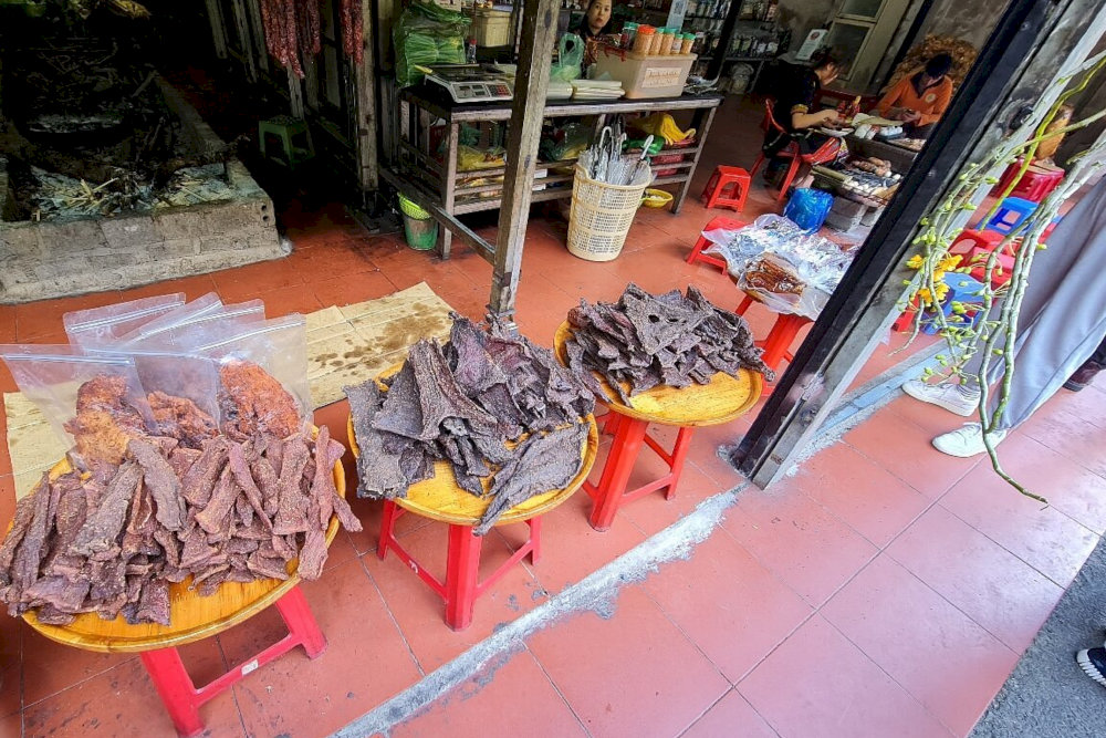 Savor the rich flavors of Northwest Vietnam with locally made dried buffalo meat, a favorite delicacy near Silver Waterfall 